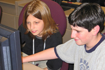 Students coding at computer camps
