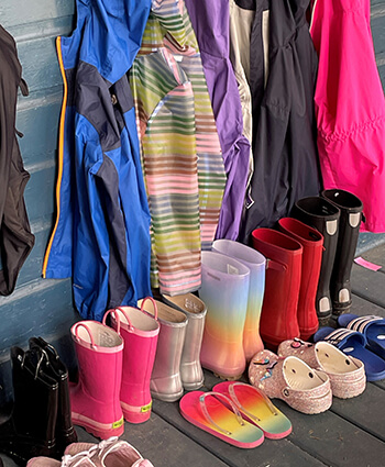 Children's summer camp wet weather gear neatly awaiting use - photo taken by The Summer Lady.